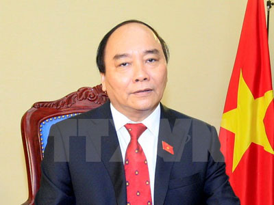 Đồng chí Nguyễn Xuân Phúc, Ủy viên Bộ Chính trị, Thủ tướng Chính phủ trả lời phỏng vấn Thông tấn xã Việt Nam và các cơ quan báo chí.